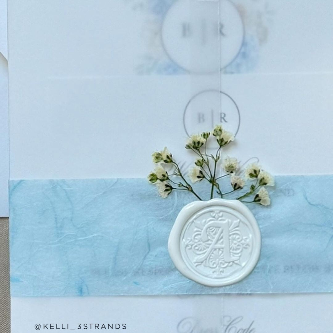 Pale Blue Belly Band on wedding invitation